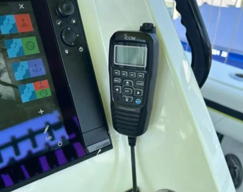 Slide: The Image of Control panel and radio on a 2020 Prowler 42 boat dashboard. - 24