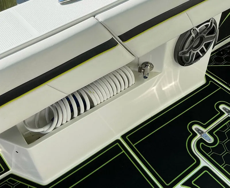 Slide: The Image of Prowler 42 boat deck detail with speaker and coiled hose, 2020 model. - 31