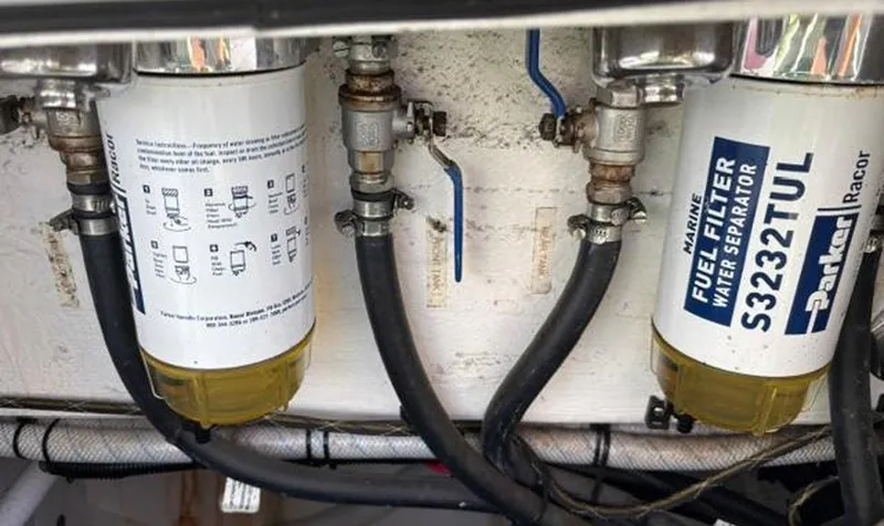 Slide: The Image of Marine fuel filters and water separators in a 2020 Prowler 42 engine compartment. - 38