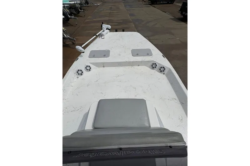 Slide: The Image of 2023 Shoalwater 23 Catamaran boat deck with speakers and trolling motor. - 13