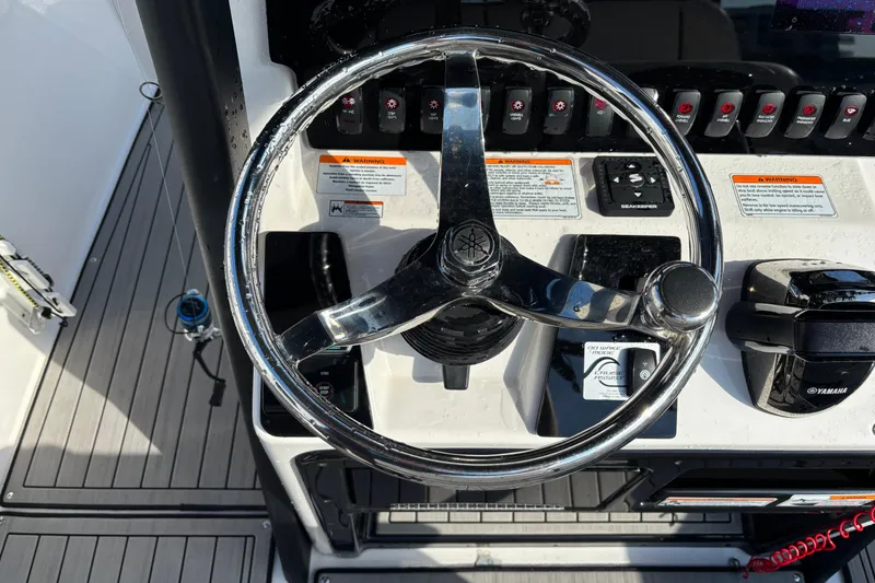 Slide: The Image of Steering wheel and controls of 2021 Yamaha Boats 255 FSH Sport E. - 16