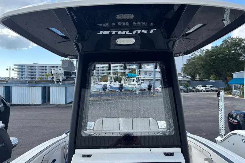 Slide: The Image of 2021 Yamaha Boats 255 FSH Sport E with Jetblast feature, docked at marina. - 31