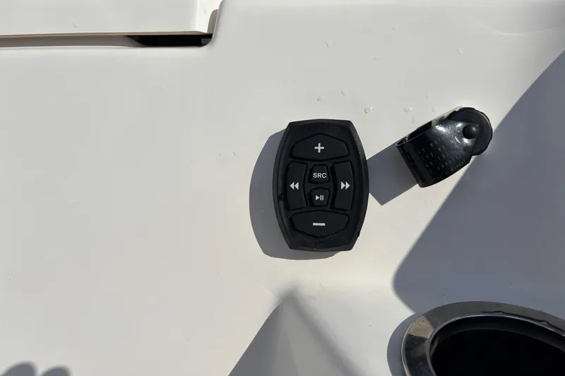 Slide: The Image of Control panel on 2021 Yamaha Boats 255 FSH Sport E, featuring audio controls. - 39