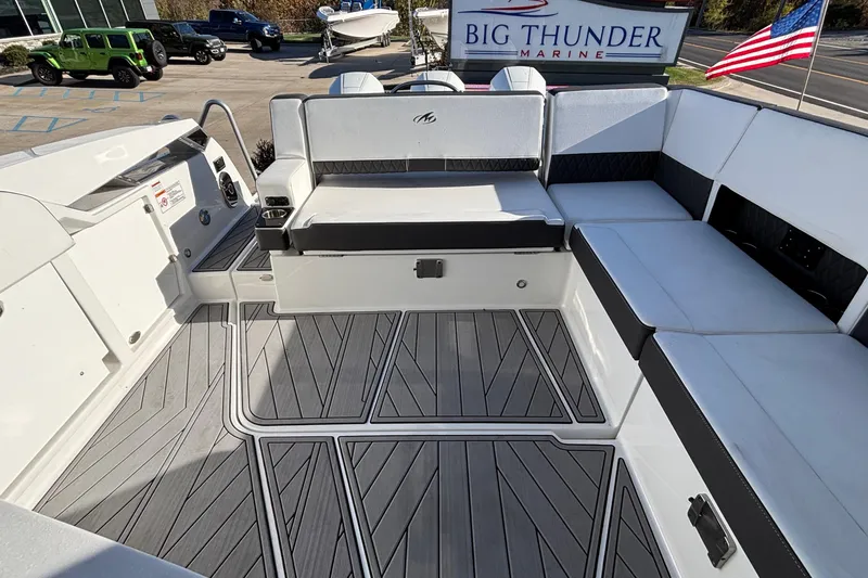 Slide: The Image of 2023 Monterey 385SS Super Sport boat interior with sleek seating and modern design. - 11