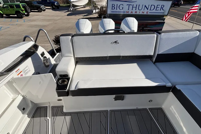 Slide: The Image of 2023 Monterey 385SS Super Sport boat interior with seating at Big Thunder Marine. - 14