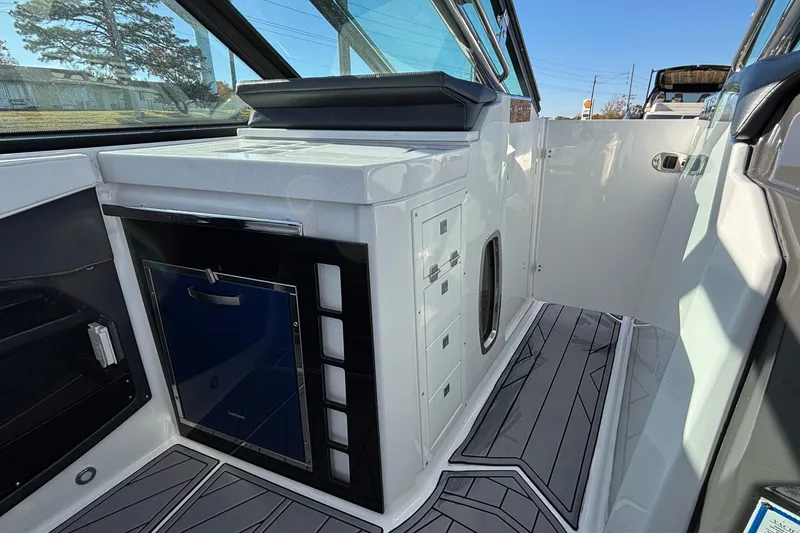 Slide: The Image of 2023 Monterey 385SS Super Sport interior with sleek cabinetry and modern design. - 20