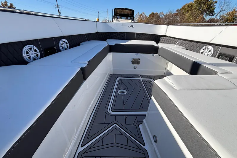 Slide: The Image of 2023 Monterey 385SS Super Sport boat interior with sleek seating and modern design. - 24