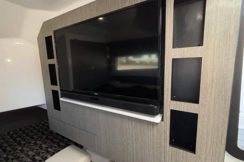 Slide: The Image of 2023 Monterey 385SS Super Sport interior with large TV and modern design. - 38