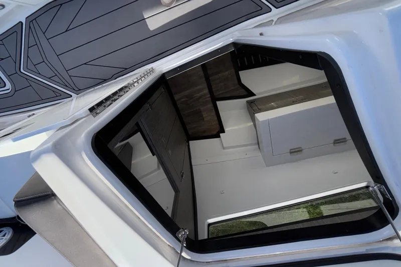 Slide: The Image of Interior view of 2023 Monterey 385SS Super Sport boat cabin with sleek design. - 40