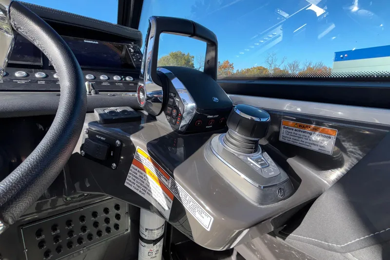 Slide: The Image of 2023 Monterey 385SS Super Sport helm with controls and steering wheel. - 47