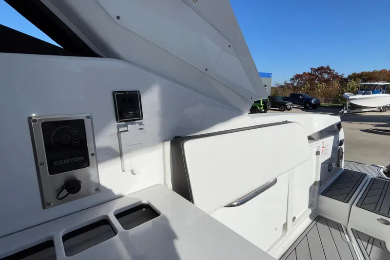 Slide: The Image of 2023 Monterey 385SS Super Sport boat interior with Kenyon control panel. - 57