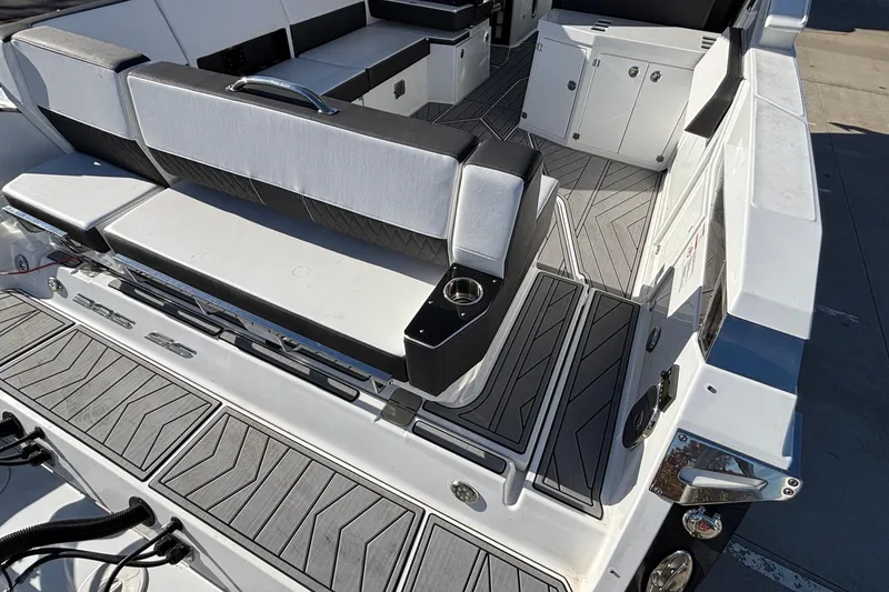 Slide: The Image of 2023 Monterey 385SS Super Sport boat interior with sleek seating and modern design. - 6