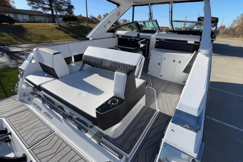 Slide: The Image of 2023 Monterey 385SS Super Sport boat interior with luxurious seating and modern design. - 60