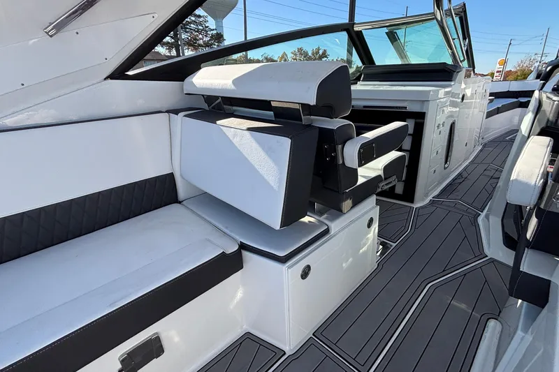 Slide: The Image of 2023 Monterey 385SS Super Sport boat interior with sleek seating and modern design. - 67