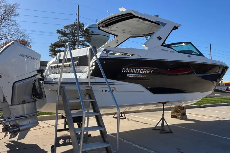 Slide: The Image of 2023 Monterey 385SS Super Sport boat on display with Mercury engine. - 73