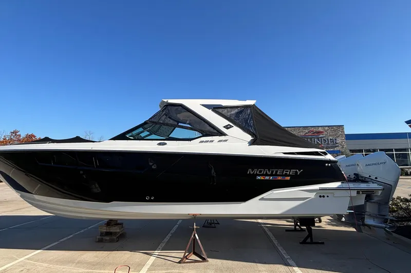 Slide: The Image of 2023 Monterey 385SS Super Sport boat on display in a parking lot. - 79