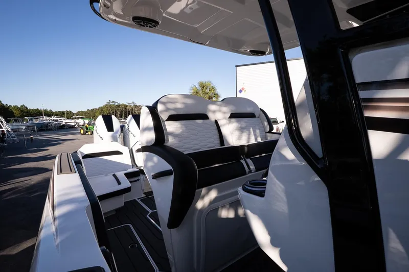 Slide: The Image of 2026 Sunsation 32 CCX boat interior with sleek seating and modern design. - 15