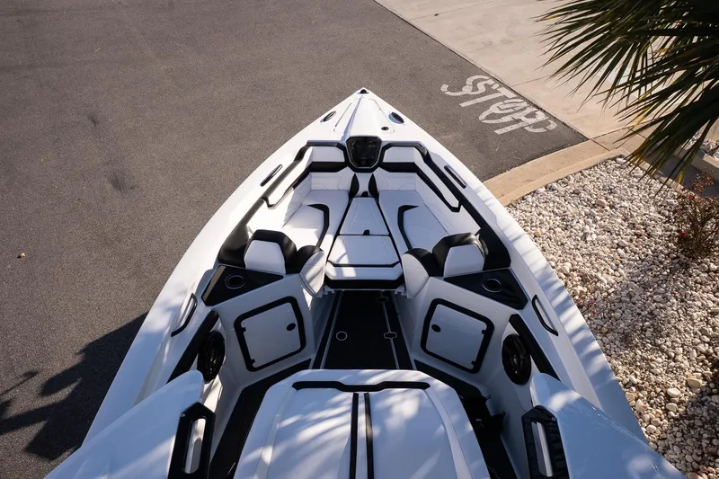 Slide: The Image of 2026 Sunsation 32 CCX boat interior with sleek white seating and modern design. - 20