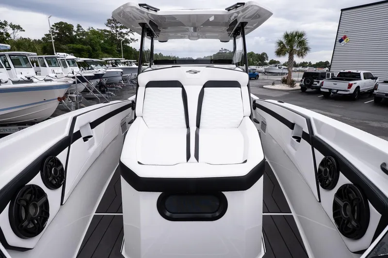 Slide: The Image of 2026 Sunsation 32 CCX boat interior with sleek white seating and modern design. - 36