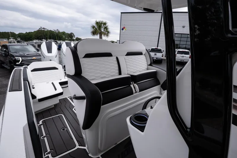 Slide: The Image of 2026 Sunsation 32 CCX boat interior with luxurious seating and modern design. - 38