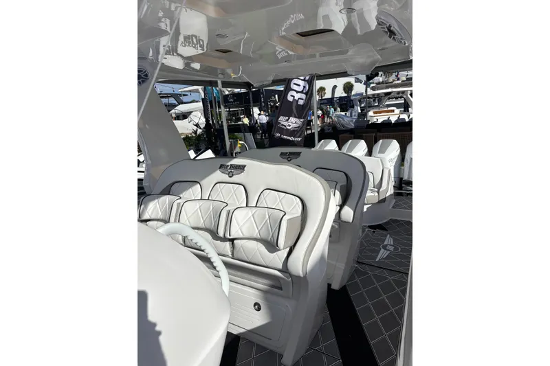 Slide: The Image of Luxurious interior of 2026 Deep Impact 399 Sport boat with elegant seating and speakers. - 11