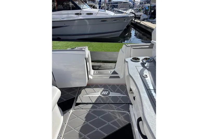 Slide: The Image of Luxurious seating on 2026 Deep Impact 399 Sport boat with modern design and speakers. - 12