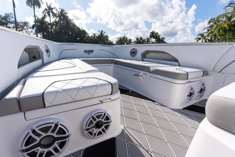Slide: The Image of Luxurious interior of 2026 Deep Impact 399 Sport boat with plush seating. - 18