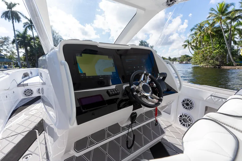 Slide: The Image of Luxury interior of 2026 Deep Impact 399 Sport boat with premium speakers and elegant design. - 22