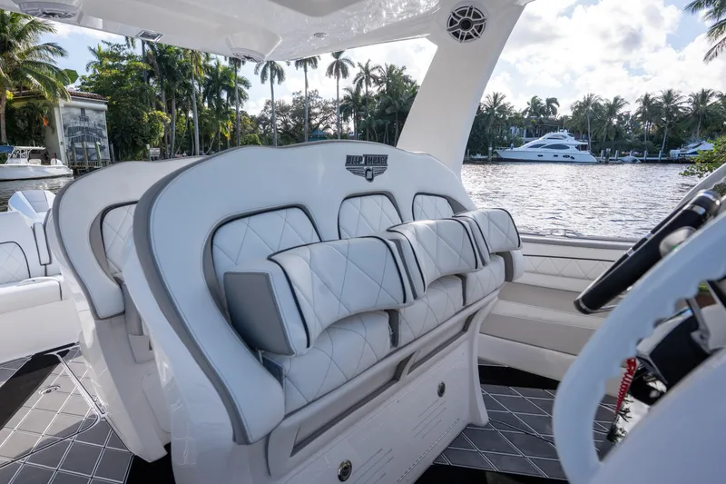 Slide: The Image of 2026 Deep Impact 399 Sport boat interior with sleek design and modern amenities. - 24