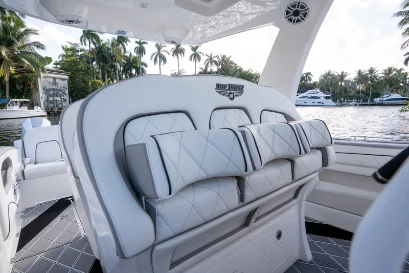 Slide: The Image of Luxury seating on 2026 Deep Impact 399 Sport boat, featuring elegant design and premium materials. - 25