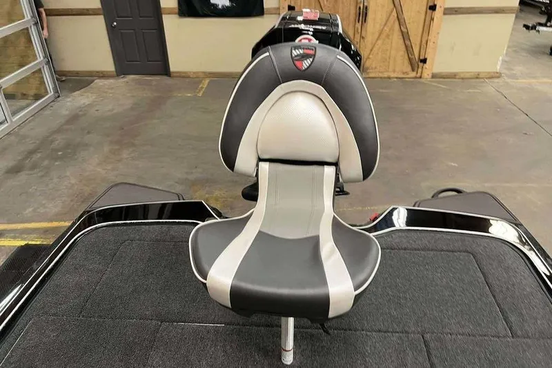 Slide: The Image of 2026 Triton 20XP Patriot boat seat in a showroom setting. - 8