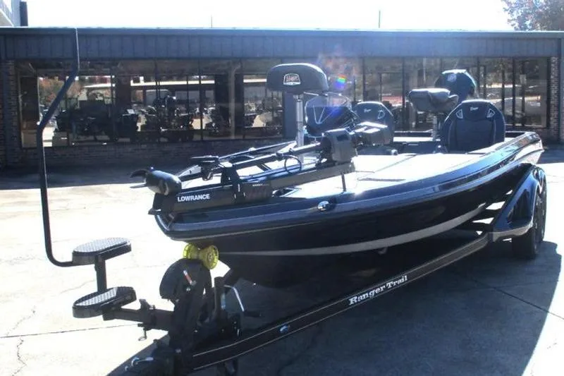Slide: The Image of 2026 Ranger Z521R Cup-Equipped boat on trailer, parked outside a building. - 12