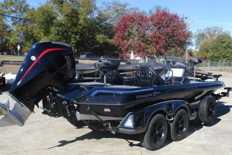 Slide: The Image of 2026 Ranger Z521R Cup-Equipped boat with sleek design and powerful engine, parked outdoors. - 3