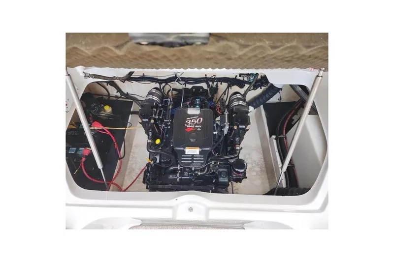 Slide: The Image of Engine compartment of a 2008 Crownline 270 BR boat, featuring a 350 MAG MPI engine. - 23