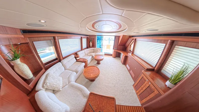 Slide: The Image of Luxurious 2009 Horizon Vision yacht interior with plush seating and elegant wood finishes. - 36