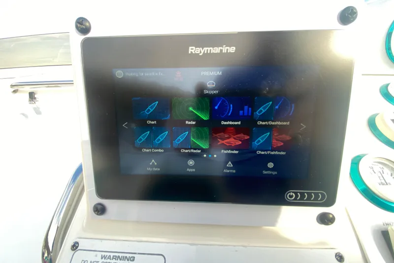 Slide: The Image of Raymarine navigation display on 1999 Black Thunder XT 430 SC boat dashboard. - 22