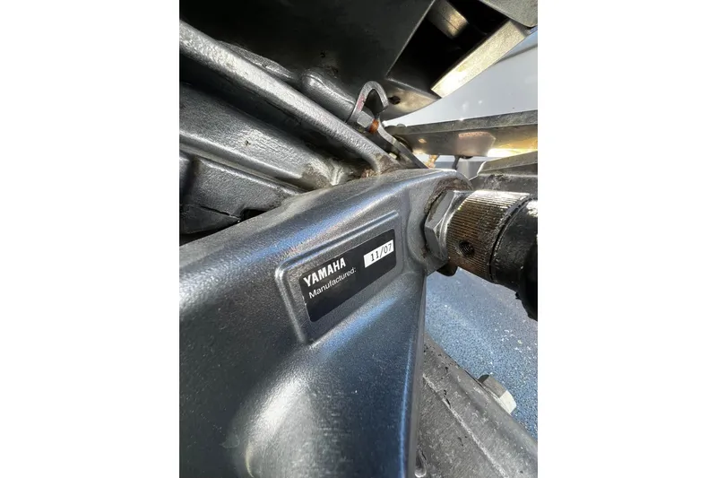Slide: The Image of Close-up of a Yamaha engine part on a 2008 North River 18 SEA HAWK boat. - 11