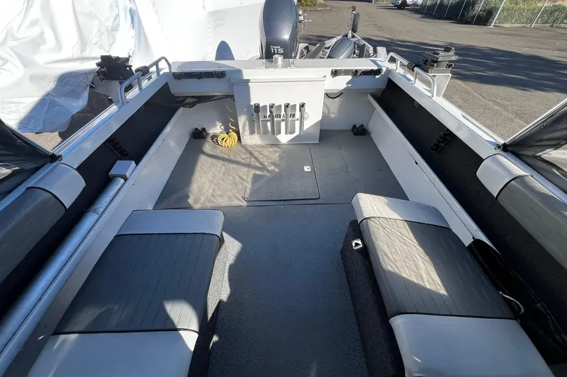 Slide: The Image of 2008 North River 18 SEA HAWK boat interior with seating and storage compartments. - 7