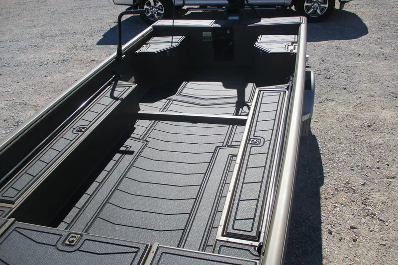 Slide: The Image of 2026 Gator Tail 1860 Extreme boat interior with textured flooring and storage compartments. - 10