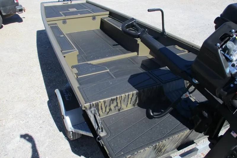 Slide: The Image of 2026 Gator Tail 1860 Extreme boat on trailer, featuring spacious deck and motor. - 4