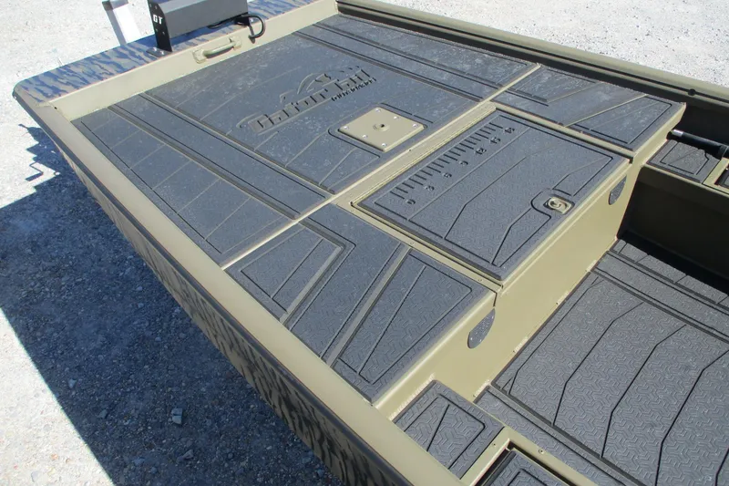 Slide: The Image of 2026 Gator Tail 1860 Extreme boat deck with textured surface and storage compartments. - 5