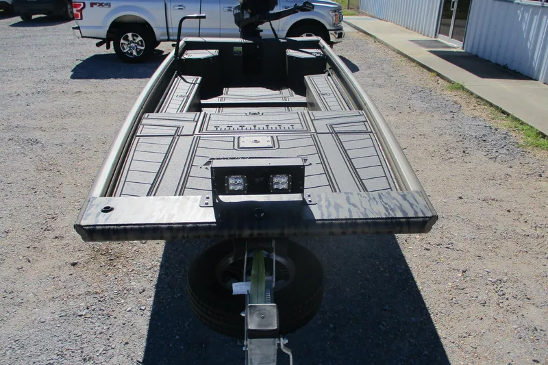 Slide: The Image of 2026 Gator Tail 1860 Extreme boat on trailer, parked outdoors. - 9