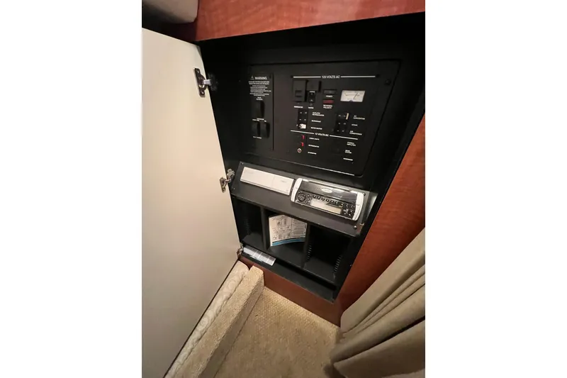 Slide: The Image of 2005 Sea Ray 280 Sundancer boat detail in marina setting. - 28