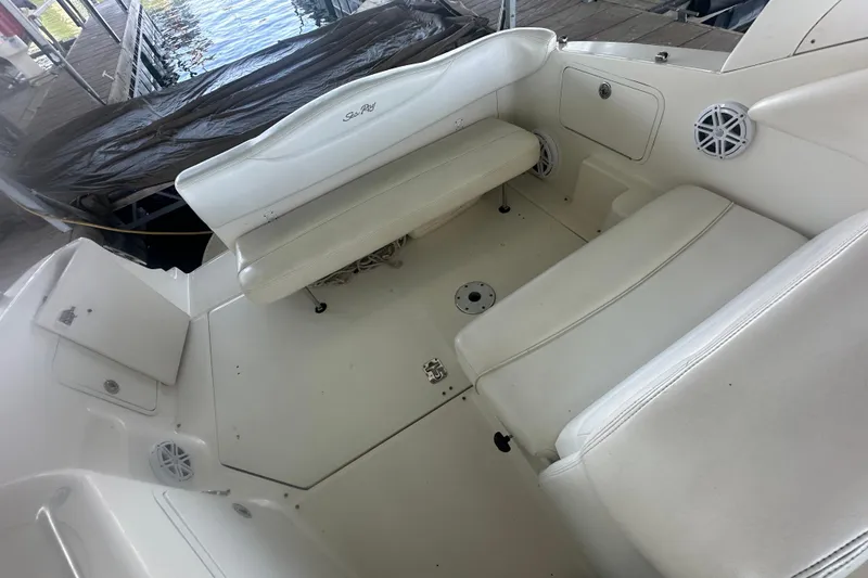 Slide: The Image of Interior of 2005 Sea Ray 280 Sundancer boat with steering wheel and seating. - 5