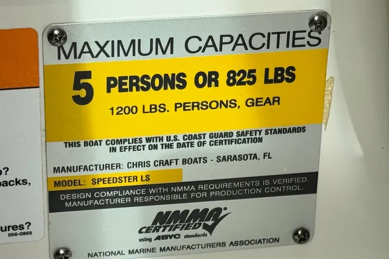 Slide: The Image of 2005 Chris-Craft Speedster capacity plate, 5 persons or 825 lbs, NMMA certified. - 28