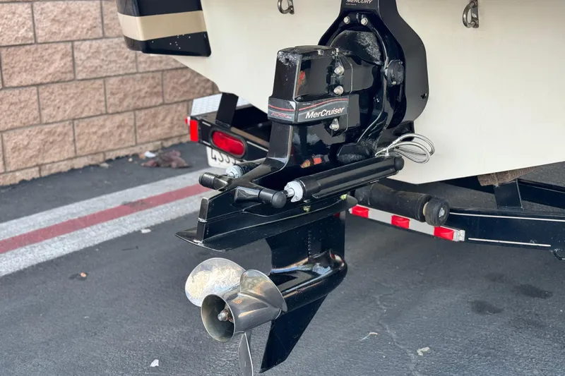 Slide: The Image of 2005 Chris-Craft Speedster with MerCruiser engine, rear view showing propeller and trailer. - 7