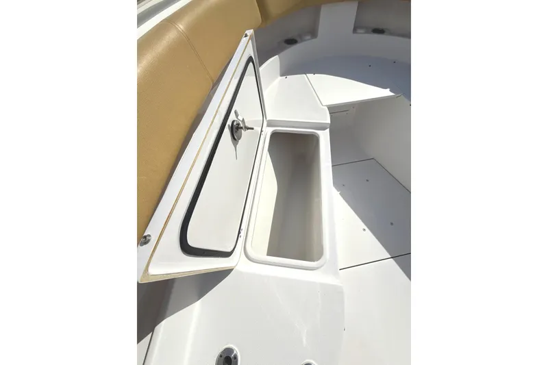 Slide: The Image of 2023 Sportsman Open 352 Center Console boat with open storage compartment. - 13