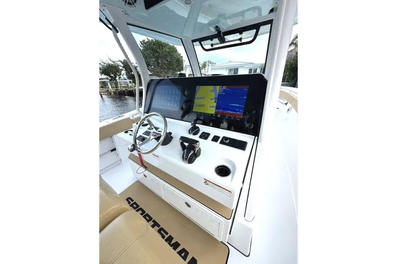 Slide: The Image of 2023 Sportsman Open 352 Center Console boat dashboard with advanced navigation system. - 25