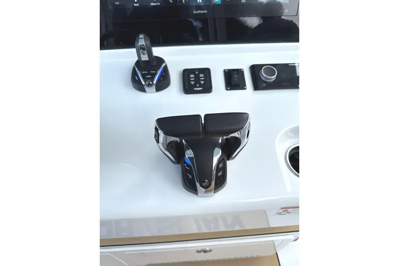 Slide: The Image of 2023 Sportsman Open 352 Center Console controls and dashboard close-up. - 28