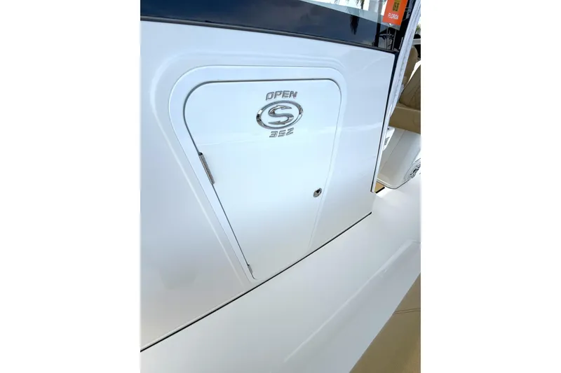 Slide: The Image of 2023 Sportsman Open 352 Center Console boat door with logo detail. - 35
